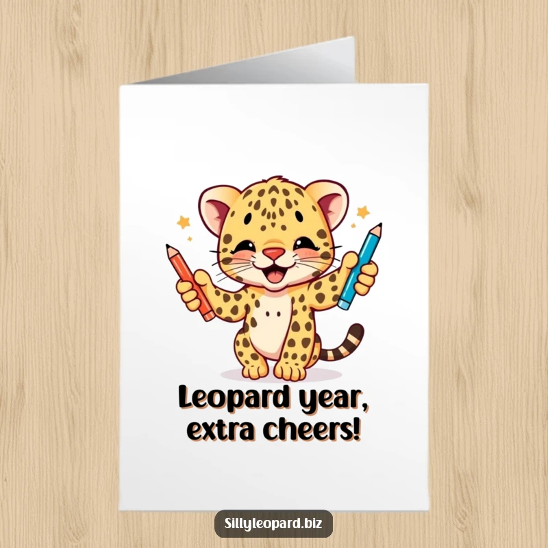 Funny Free Printable Birthday Card featuring a joyful leopard cub enthusiastically juggling colorful pens, spreading birthday cheer.