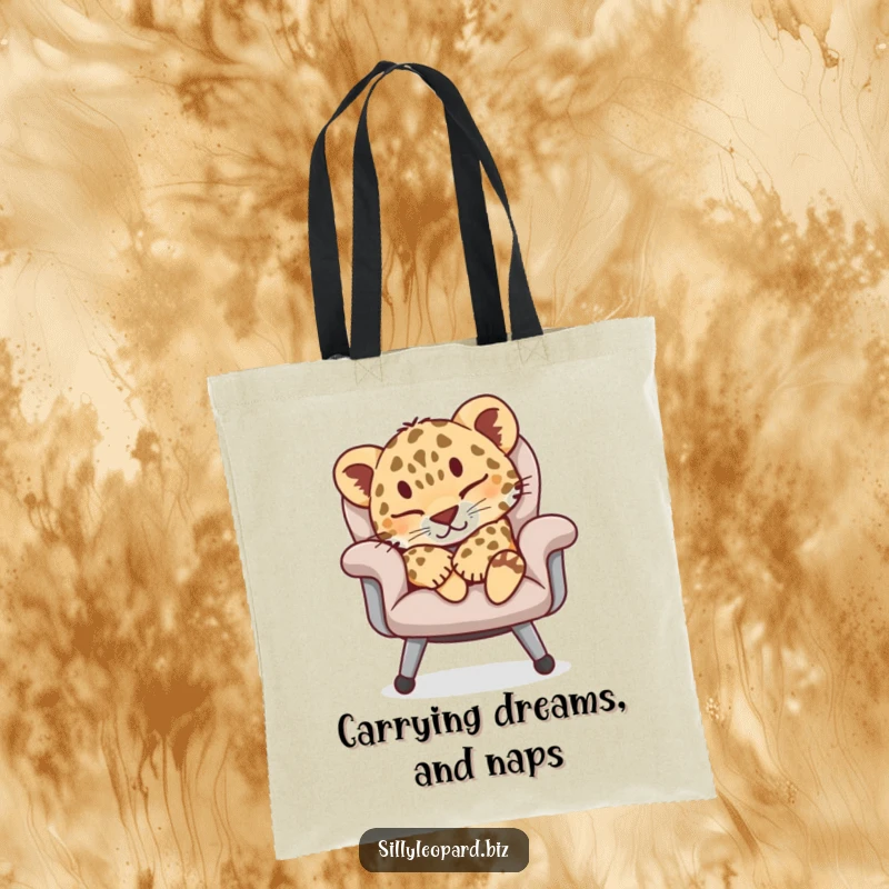 Funny tote bag illustrating a content leopard cub napping soundly on an office chair, a charming and practical humorous accessory.